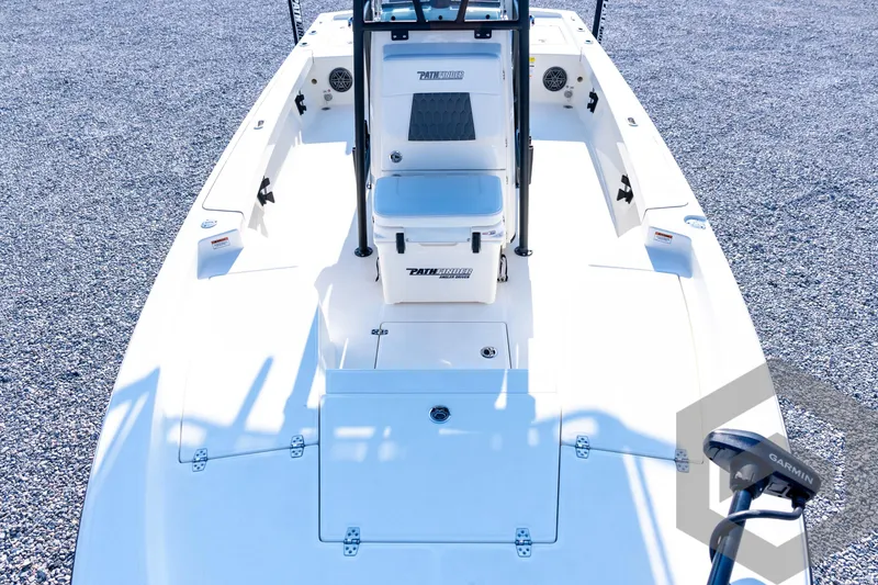 Slide: The Image of 2026 Pathfinder 2200 TRS boat interior with seating and Garmin equipment. - 43