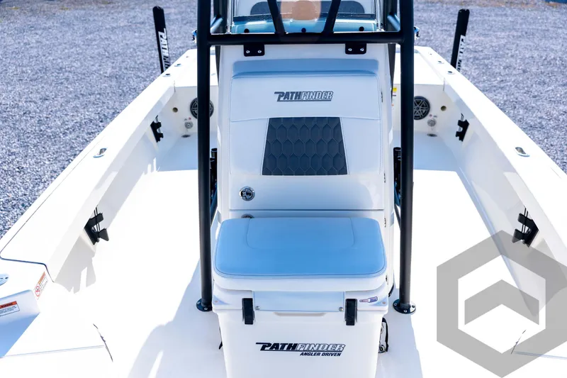 Slide: The Image of 2026 Pathfinder 2200 TRS boat interior with seating and storage, featuring sleek design elements. - 44