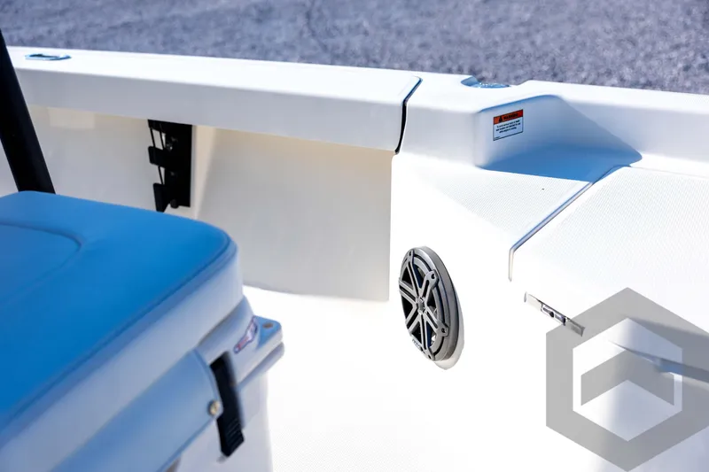 Slide: The Image of Interior of 2026 Pathfinder 2200 TRS boat with speaker and storage compartment. - 48