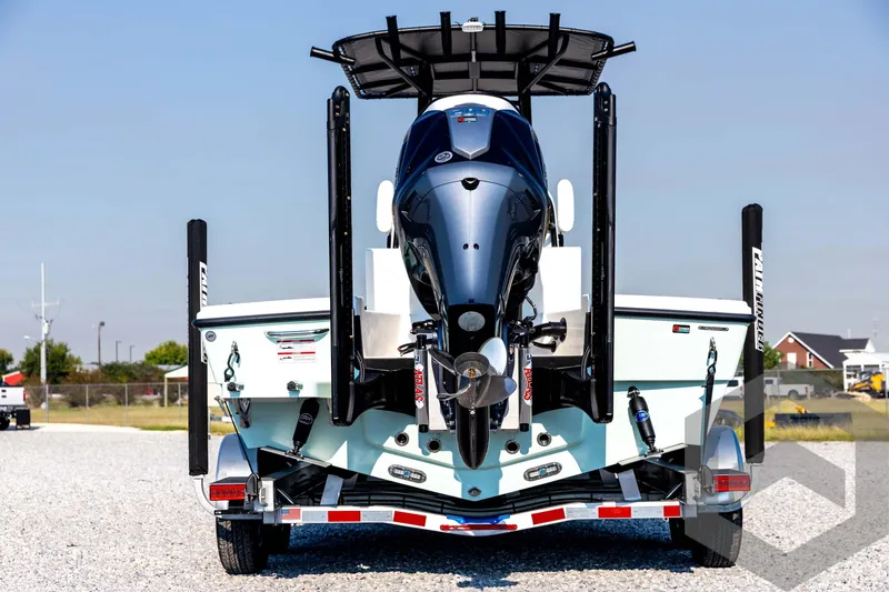 Slide: The Image of 2026 Pathfinder 2200 TRS boat on trailer, rear view, outdoors. - 6