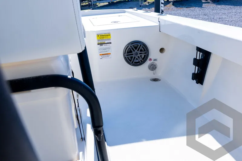 Slide: The Image of 2026 Pathfinder 2200 TRS boat interior with speaker and storage features. - 63