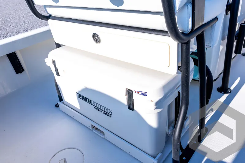 Slide: The Image of 2026 Pathfinder 2200 TRS boat interior with cooler and seating. - 67
