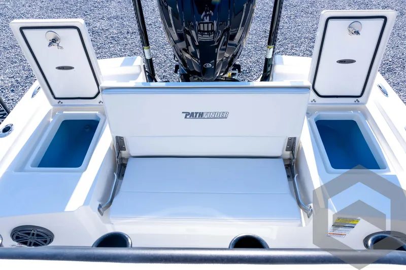 Slide: The Image of 2026 Pathfinder 2200 TRS boat interior with open storage compartments and seating. - 71