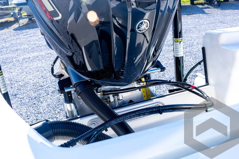 Slide: The Image of 2026 Pathfinder 2200 TRS boat engine close-up with cables and components. - 76