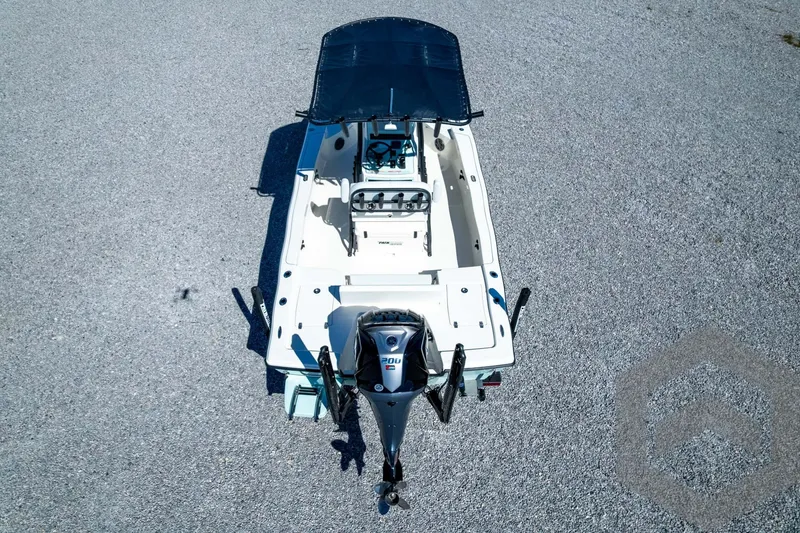 Slide: The Image of Aerial view of 2026 Pathfinder 2200 TRS boat on gravel surface. - 78