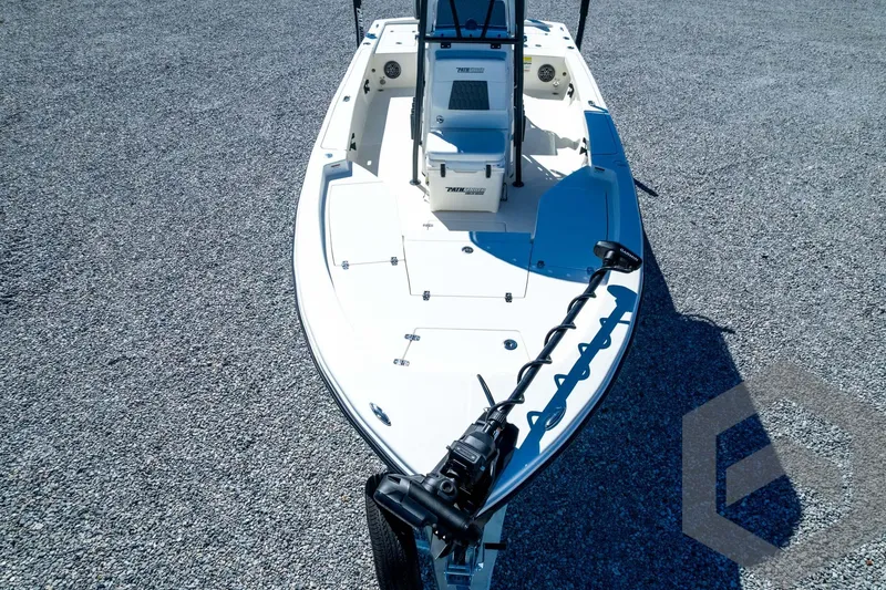Slide: The Image of 2026 Pathfinder 2200 TRS boat on gravel, featuring sleek design and modern equipment. - 87