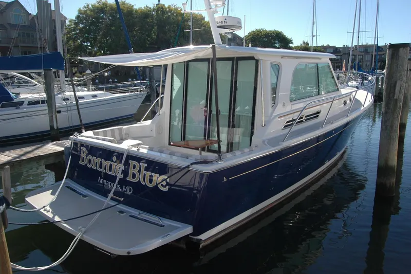 Slide: The Image of 2015 Back Cove 37 boat named "Bonnie Blue" docked in Annapolis, MD marina. - 12