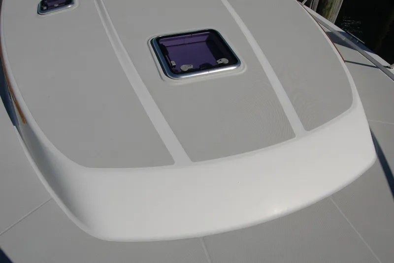 Slide: The Image of 2015 Back Cove 37 boat deck with hatch, showcasing sleek design and craftsmanship. - 23