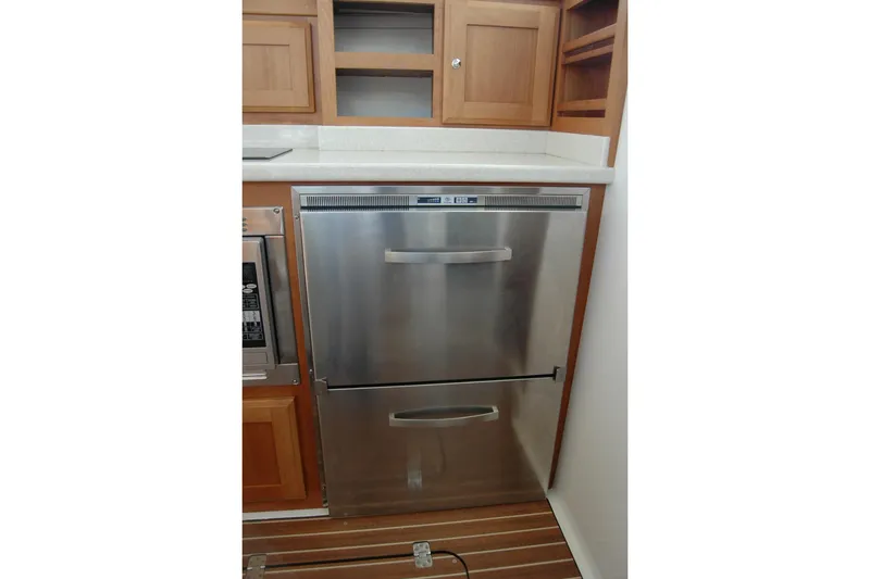 Slide: The Image of Stainless steel refrigerator in 2015 Back Cove 37 yacht kitchen. - 61