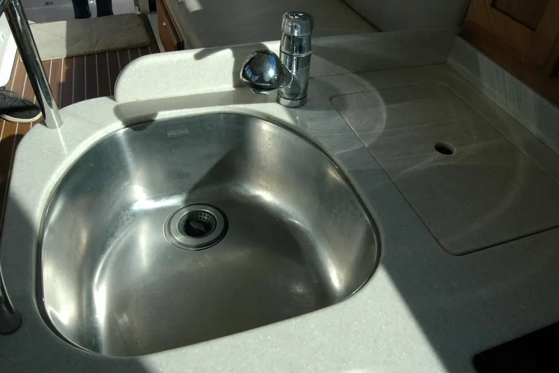 Slide: The Image of Stainless steel sink in 2015 Back Cove 37 yacht kitchen area. - 63