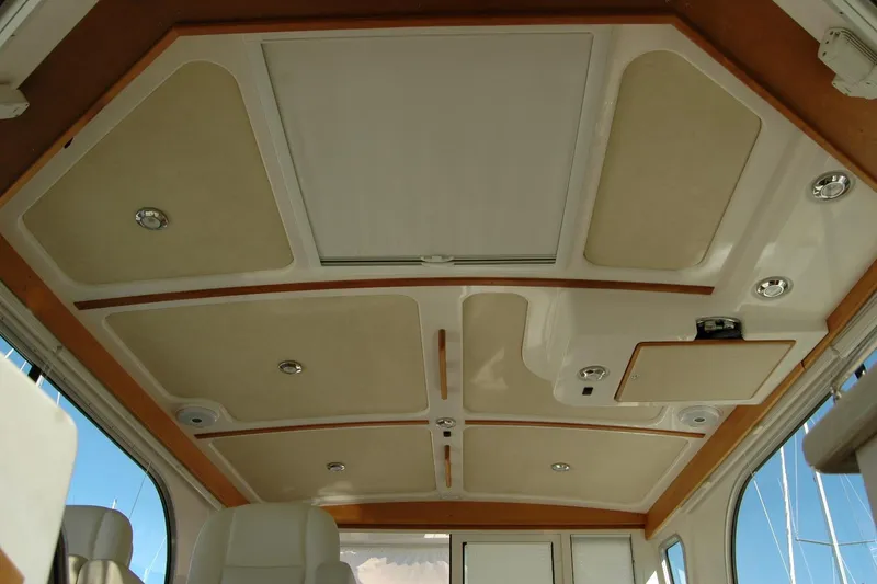 Slide: The Image of Interior ceiling of a 2015 Back Cove 37 boat with recessed lighting. - 65