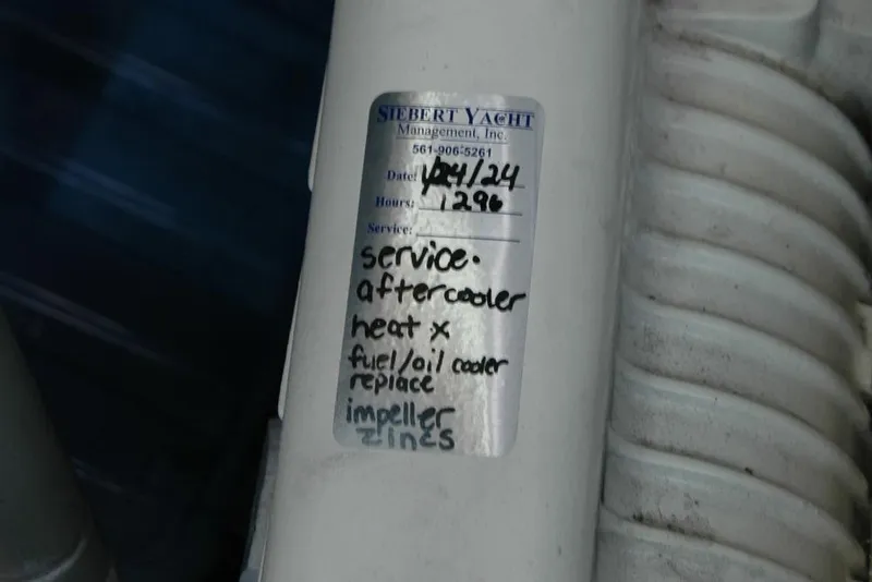 Slide: The Image of Service label on a 2015 Back Cove 37 yacht engine component. - 94