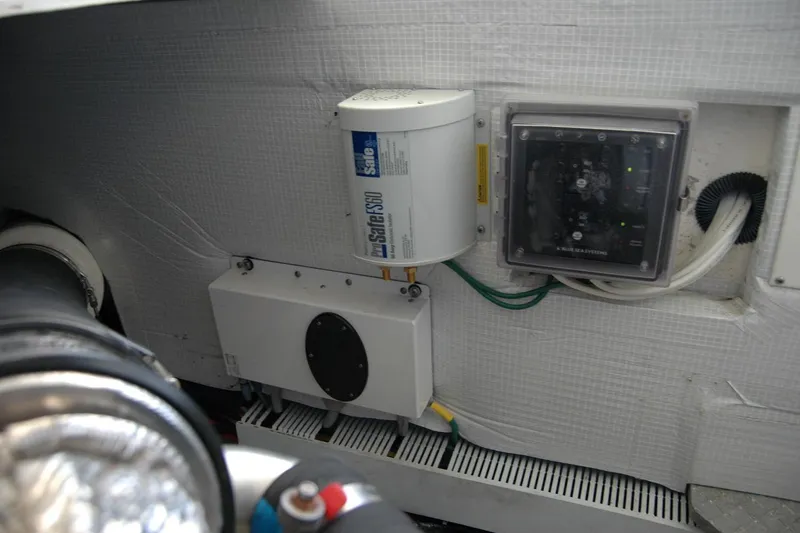 Slide: The Image of Engine room of 2015 Back Cove 37 boat with electrical components and wiring. - 97