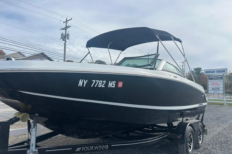 Slide: The Image of 2022 Four Winns HD2 OB boat on trailer at Morgan Marine dealership. - 4