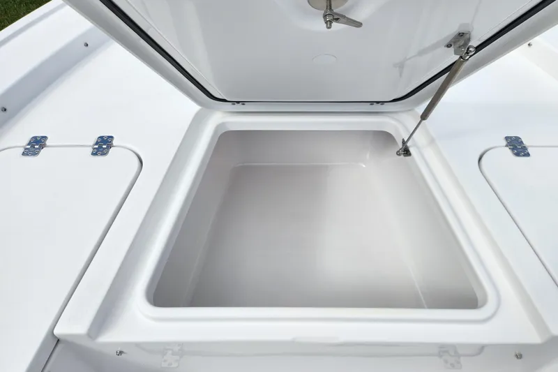 Slide: The Image of Open storage compartment on 2026 Sportsman Masters 247 Bay Boat. - 12