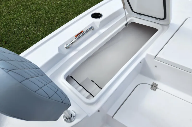 Slide: The Image of Open storage compartment on 2026 Sportsman Masters 247 Bay Boat, featuring sleek design and seating. - 15