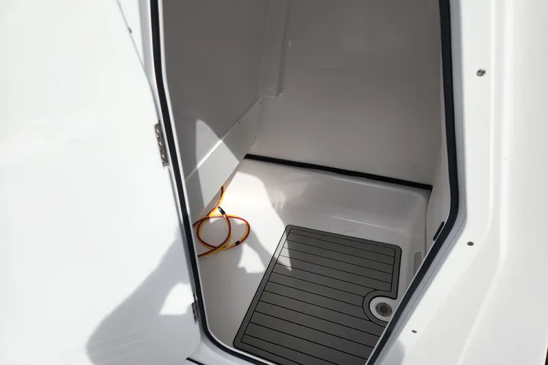 Slide: The Image of Interior compartment of 2026 Sportsman Masters 247 Bay Boat, featuring a clean, spacious design. - 21