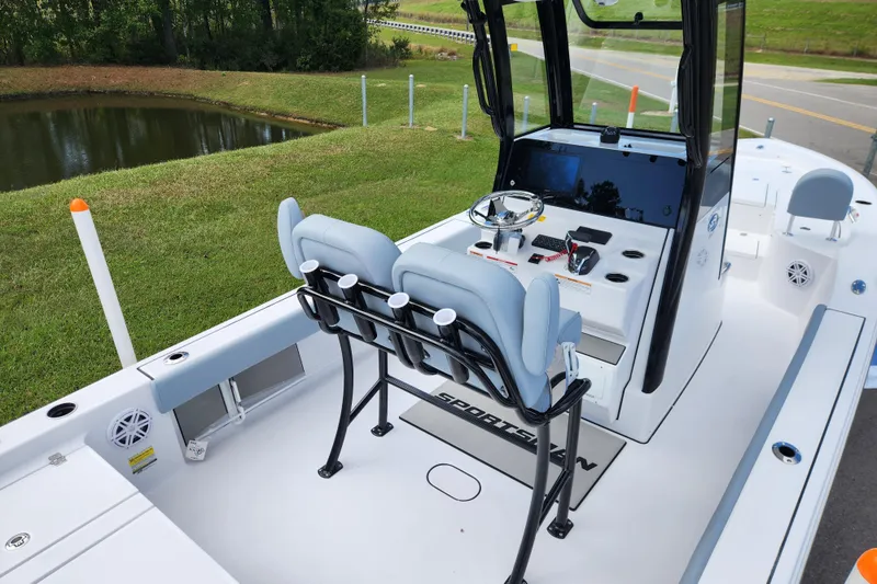 Slide: The Image of 2026 Sportsman Masters 247 Bay Boat interior with dual seats and steering console. - 25