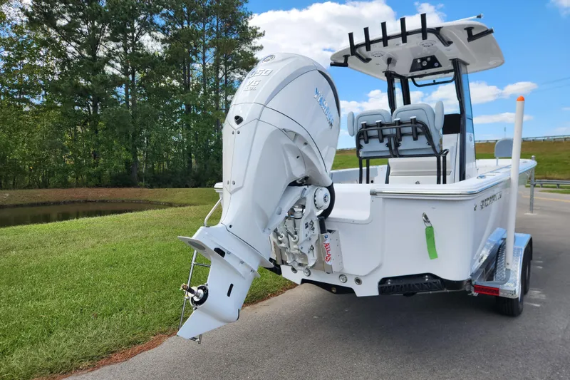 Slide: The Image of 2026 Sportsman Masters 247 Bay Boat with Yamaha 300 V6 engine, parked outdoors. - 3