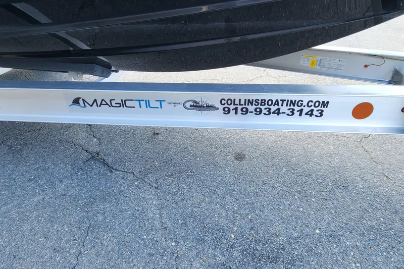 Slide: The Image of Trailer for 2026 Sportsman Masters 247 Bay Boat by Magic Tilt, Collins Boating contact info. - 34