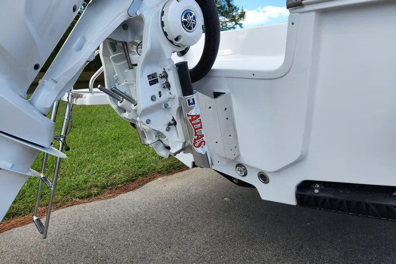 Slide: The Image of 2026 Sportsman Masters 247 Bay Boat with Atlas jack plate and outboard motor. - 9