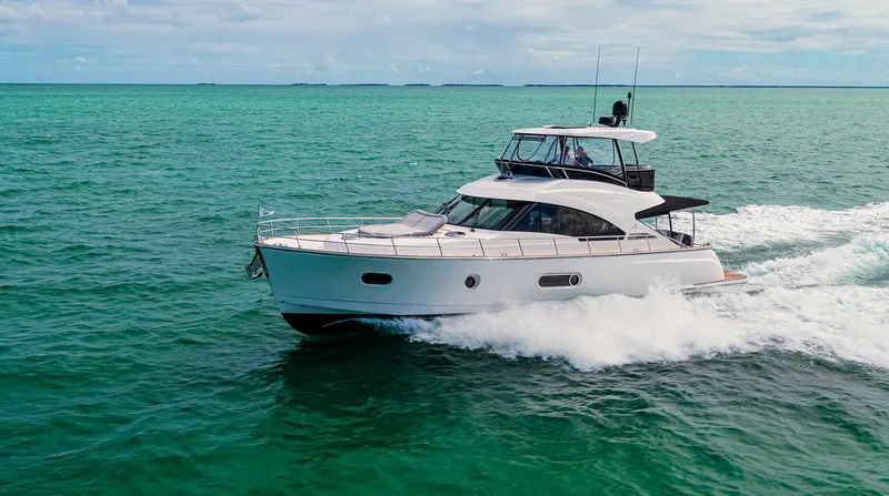 The Image of 2024 Belize 54 Daybridge yacht cruising on open water. - 0