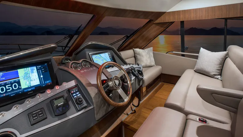 Slide: The Image of 2024 Belize 54 Daybridge yacht interior with modern helm and luxurious seating. - 15