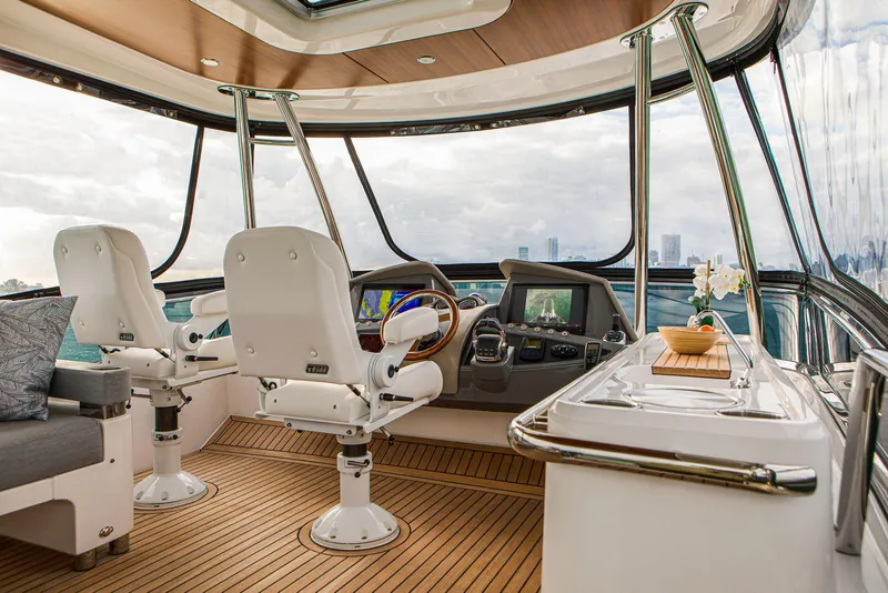 Slide: The Image of Interior of 2024 Belize 54 Daybridge yacht with modern helm and seating. - 7
