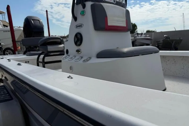 Slide: The Image of 2017 Blazer Bay 2420 GTS boat interior with seating and control panel. - 8