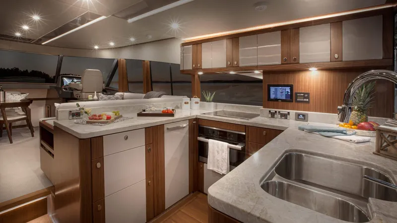 Slide: The Image of Luxurious kitchen interior of 2024 Belize 66 Daybridge yacht with modern appliances and sleek design. - 14