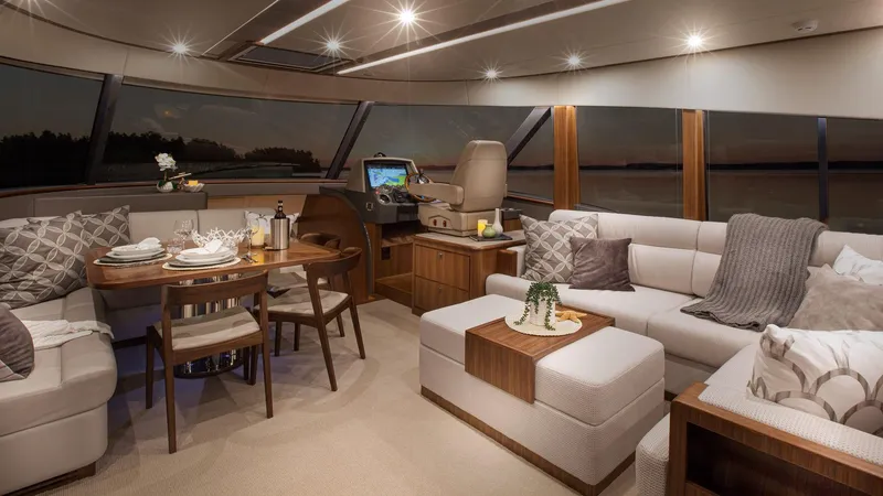Slide: The Image of Luxurious interior of 2024 Belize 66 Daybridge yacht with elegant seating and dining area. - 16