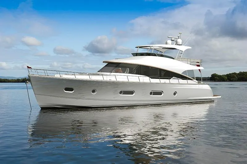 Slide: The Image of 2024 Belize 66 Daybridge luxury yacht on calm water. - 6