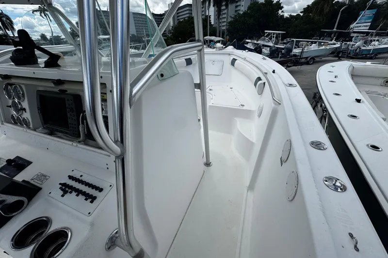 Slide: The Image of 2008 Sea Fox 287 CC boat interior with control panel and seating area. - 26
