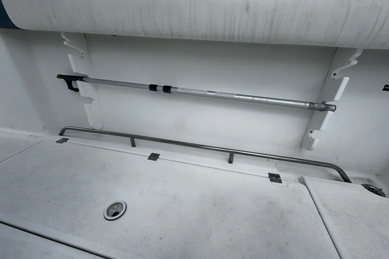 Slide: The Image of 2008 Sea Fox 287 CC boat interior with mounted equipment and storage area. - 4