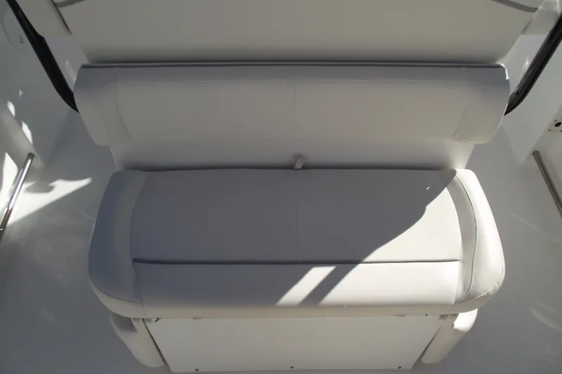 Slide: The Image of 2023 Sea Hunt Ultra 255 SE boat seat, white upholstery, top view. - 29