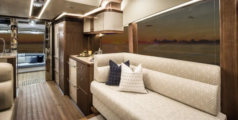 Slide: The Image of Luxurious interior of 2024 Belize 66 Sedan yacht with elegant seating and modern decor. - 8