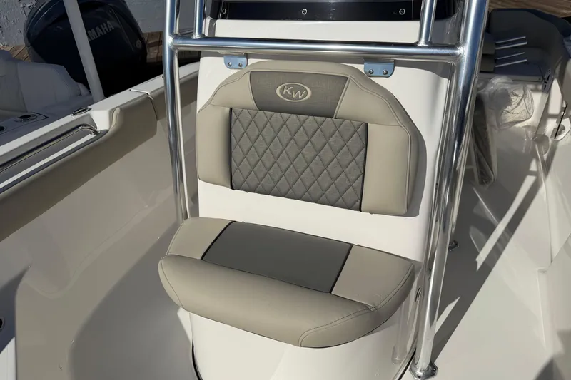 Slide: The Image of 2026 Key West 203 FS boat seat with diamond-patterned upholstery and stainless steel frame. - 20