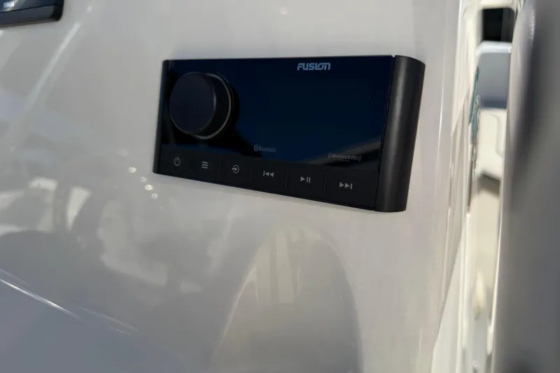 Slide: The Image of Fusion audio system on 2026 Key West 203 FS boat dashboard. - 27