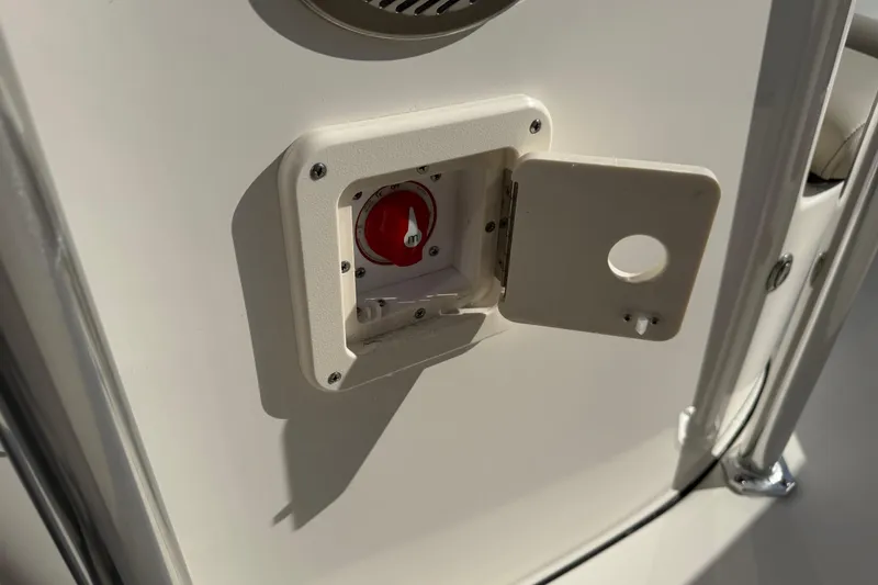 Slide: The Image of Battery switch compartment on a 2026 Key West 203 FS boat. - 36