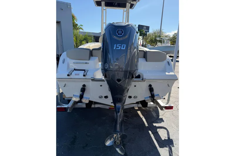 Slide: The Image of 2026 Key West 203 FS boat with Yamaha 150 outboard motor, rear view. - 9