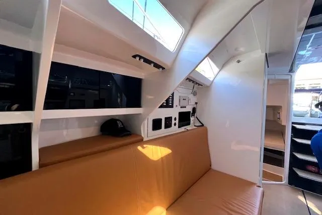 Slide: The Image of Interior of 2024 Neo 43 Romo yacht with modern seating and control panels. - 11