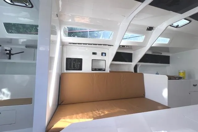 Slide: The Image of Interior of 2024 Neo 43 Romo yacht with modern design and beige seating. - 9