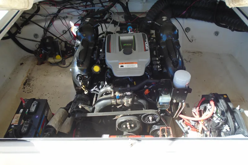 Slide: The Image of Engine compartment of a 2014 Regal 2300 Bowrider boat, showing detailed wiring and components. - 18