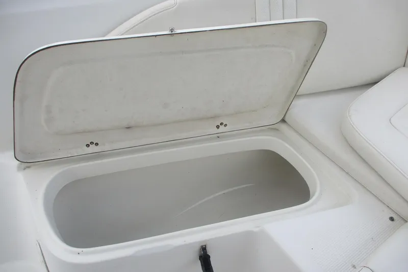 Slide: The Image of Open storage compartment on 2005 Sailfish 236 CC boat interior. - 16
