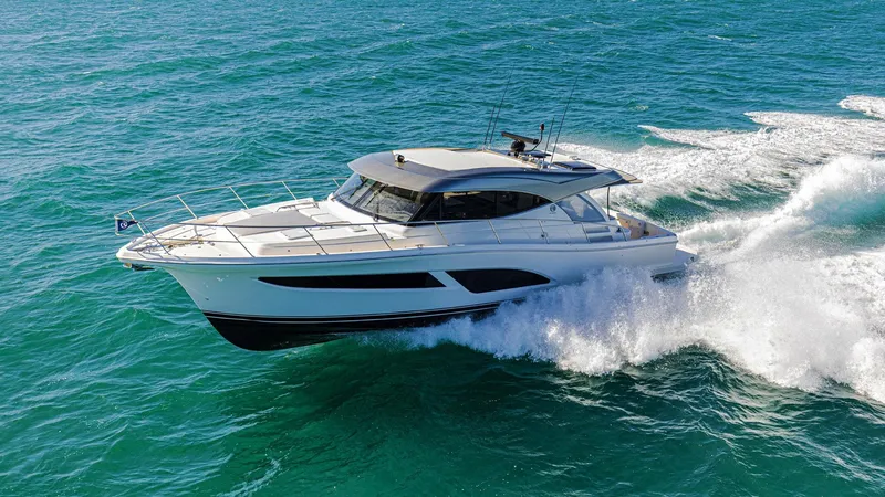 The Image of 2024 Riviera 465 SUV cruising on open water. - 0