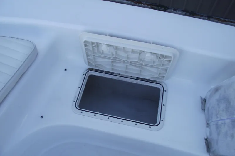 Slide: The Image of Open storage compartment on 2021 Savannah SS21 boat deck. - 11