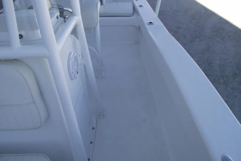 Slide: The Image of 2021 Savannah SS21 boat interior with white seating and speaker detail. - 14