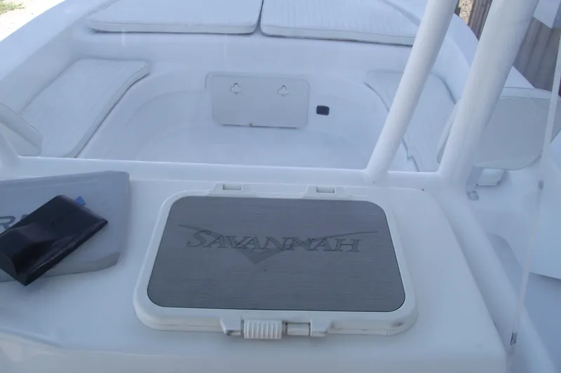 Slide: The Image of 2021 Savannah SS21 boat interior with branded hatch and seating area. - 21