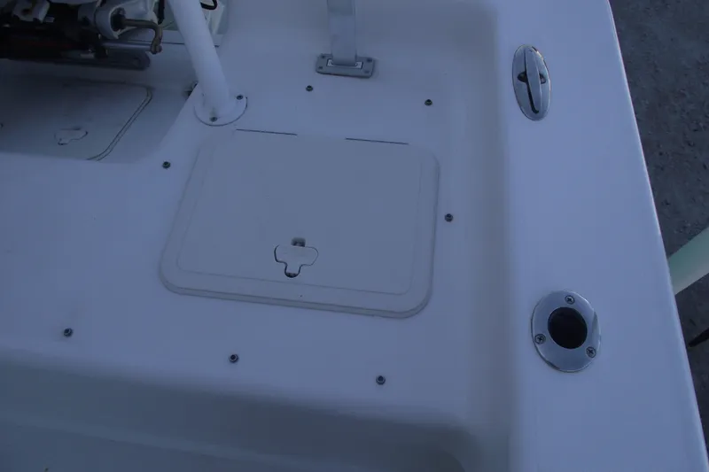 Slide: The Image of 2021 Savannah SS21 boat deck with storage hatch and rod holder. - 24