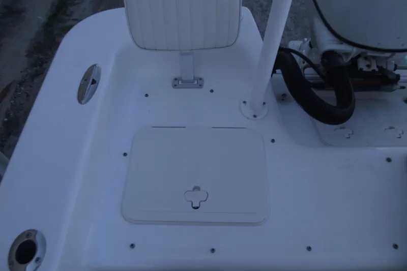 Slide: The Image of 2021 Savannah SS21 boat deck with storage compartment and seat. - 27